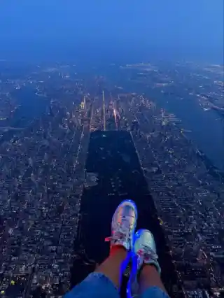 Light up shoes over a lit up city 🌙📸       